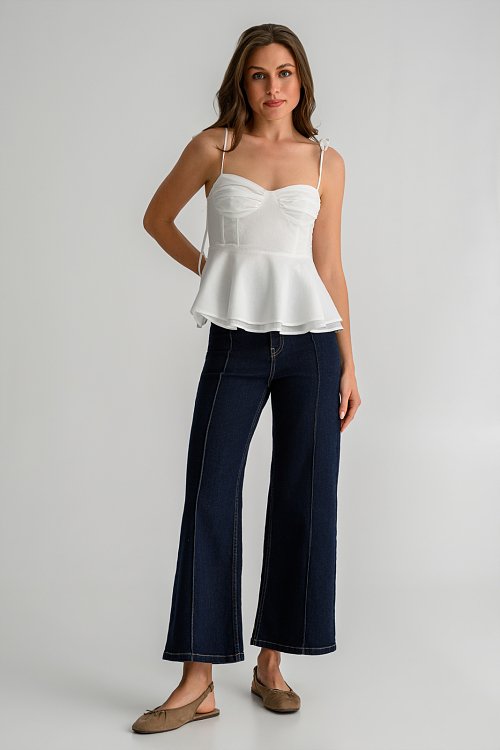Top with thin straps tie and peplum hem