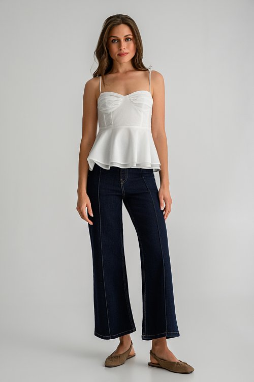 Top with thin straps tie and peplum hem