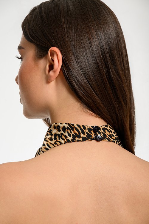 Halter neck leopard top with asymmetric hem
