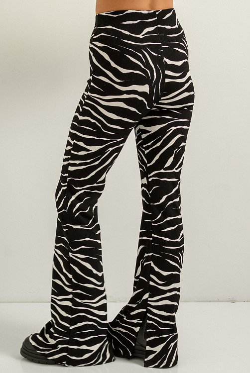 Flared trousers with zebra print