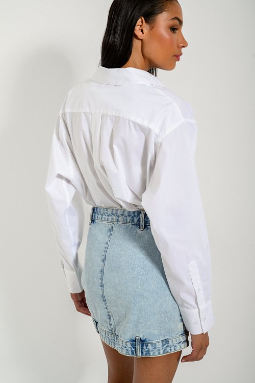 Mini denim skirt with asymmetric details