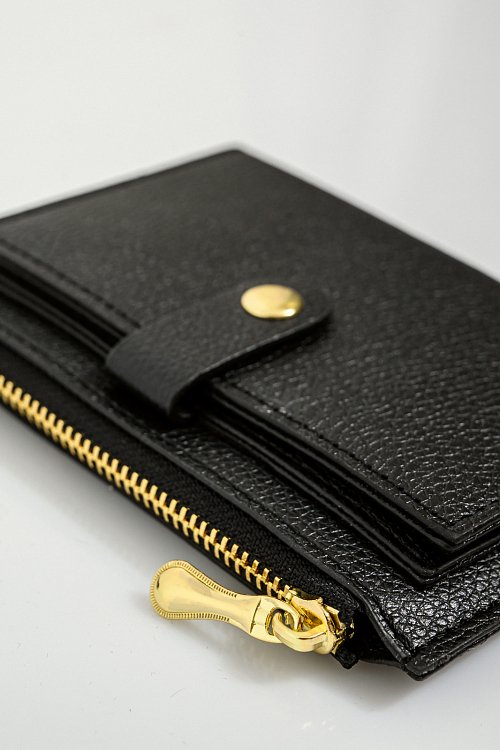 Wallet with leather effect and button closure