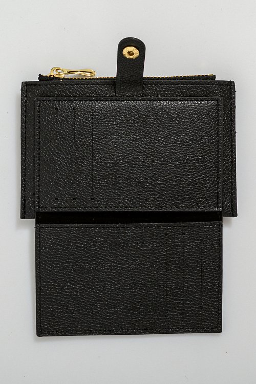 Wallet with leather effect and button closure