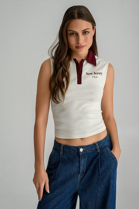 Sleeveless polo top with front print