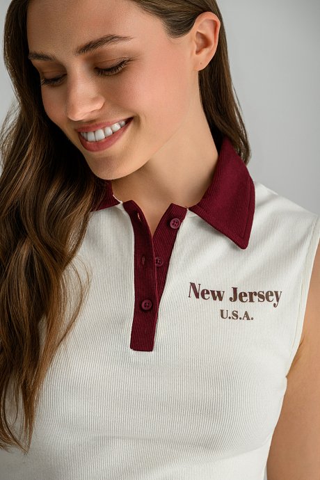 Sleeveless polo top with front print