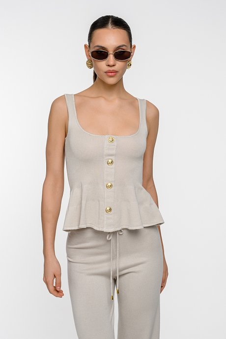 Πλεκτό τοπ με peplum και χρυσά κουμπιά