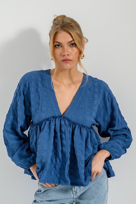Blouse with ruffled details and V neckline