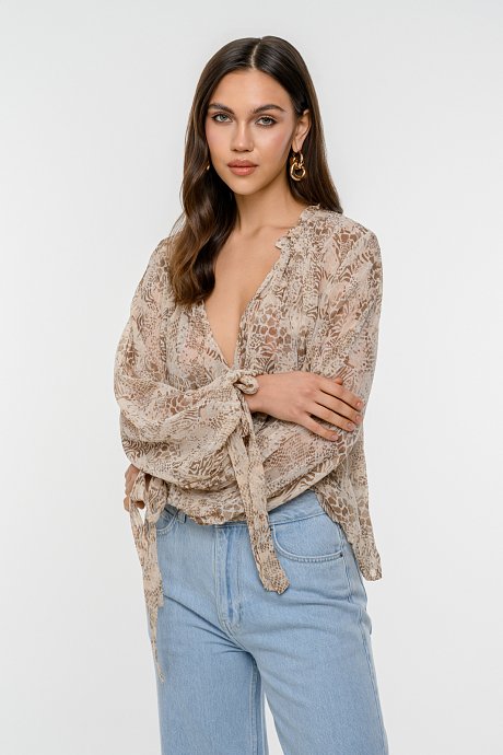 Semi see through top with animal print