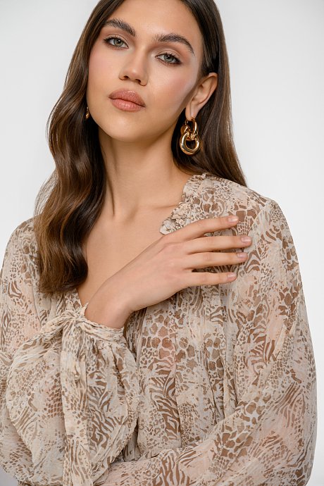 Semi see through top with animal print