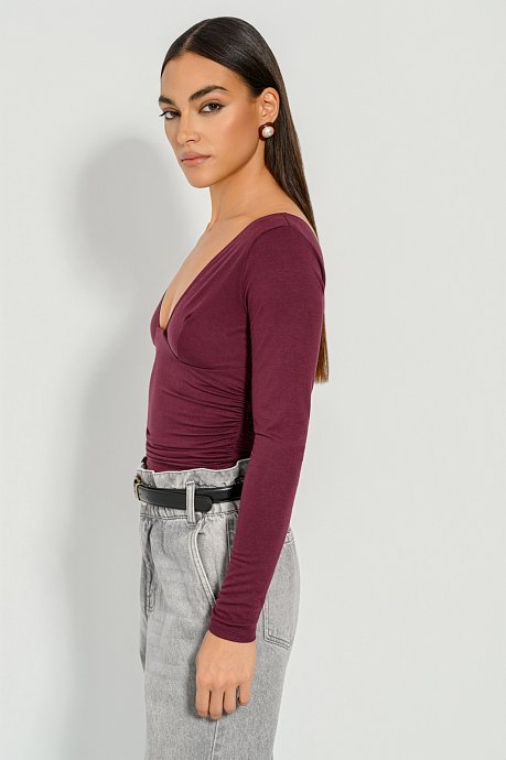Top with V neckline and open back