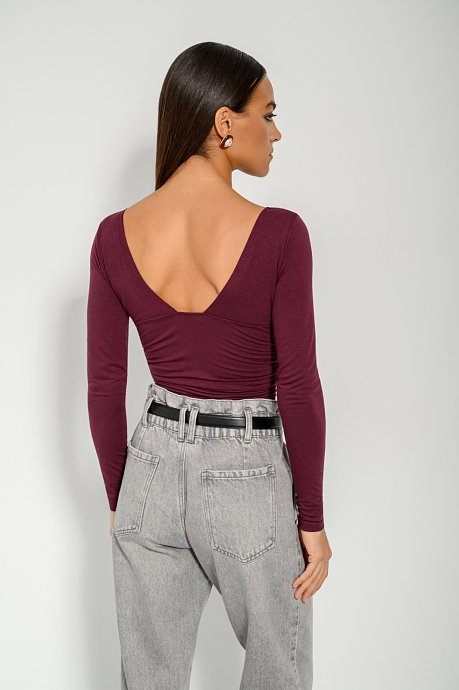 Top with V neckline and open back