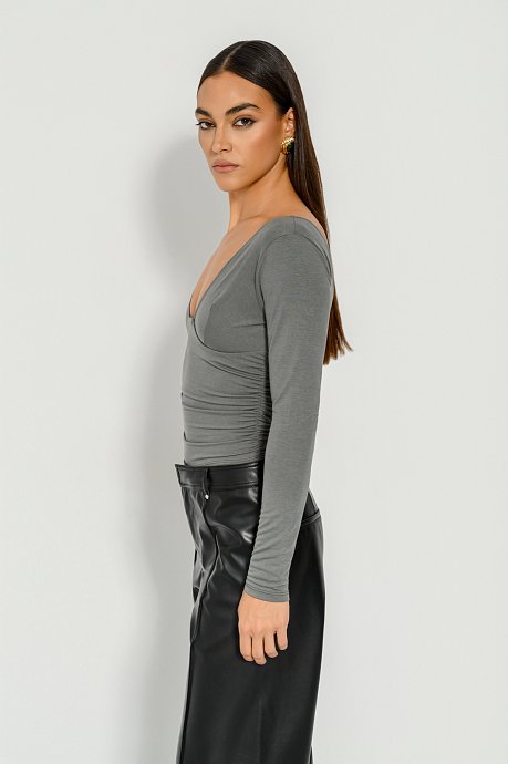 Top with V neckline and open back