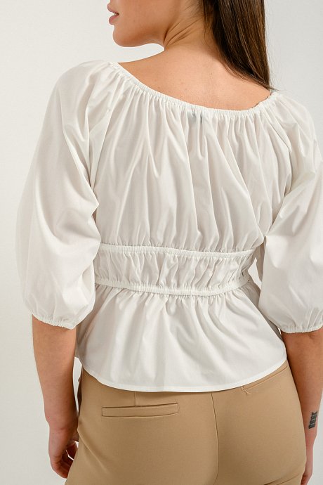 Ruffled top with gathering details