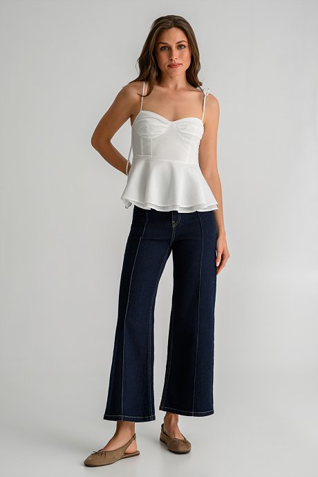 Top with thin straps tie and peplum hem