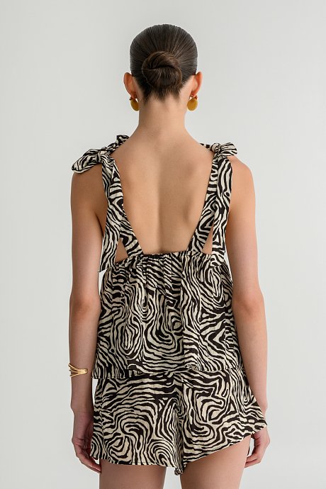 Rustic top with zebra print and tie-straps