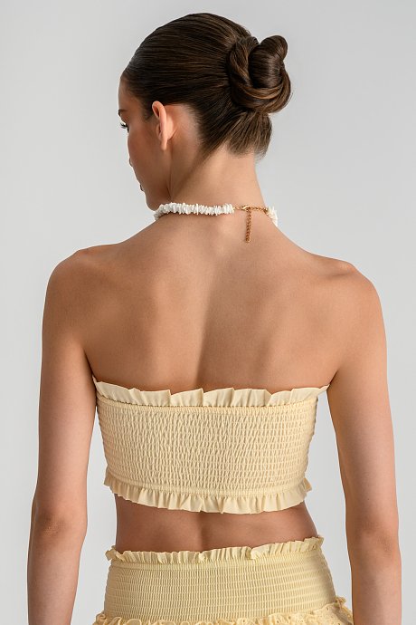 Strapless κροπ τοπ με σφηκοφωλιά