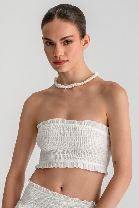 Strapless κροπ τοπ με σφηκοφωλιά