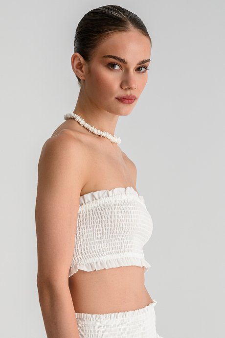 Strapless κροπ τοπ με σφηκοφωλιά