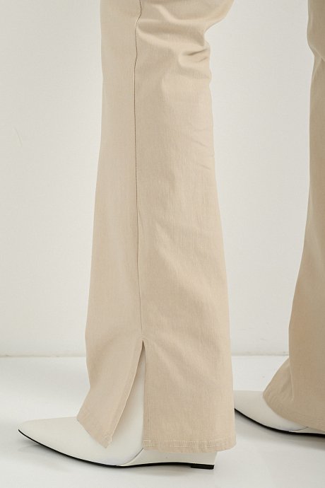 Flared trousers with cut out detail