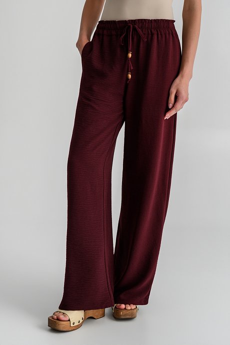 Wide leg παντελόνα με κορδόνι με χάντρες