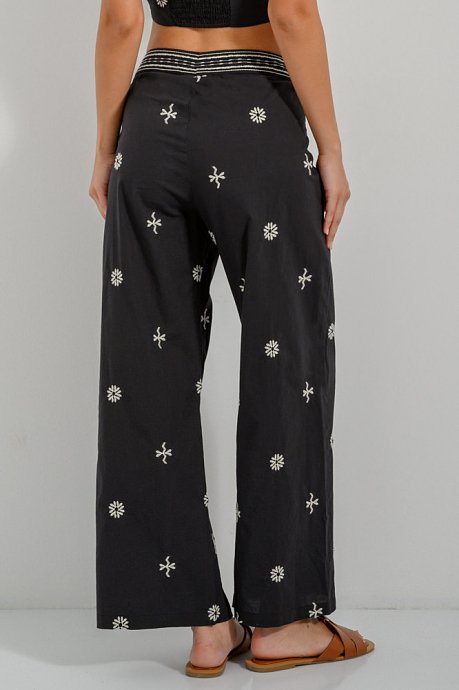 Trousers with embroidered details