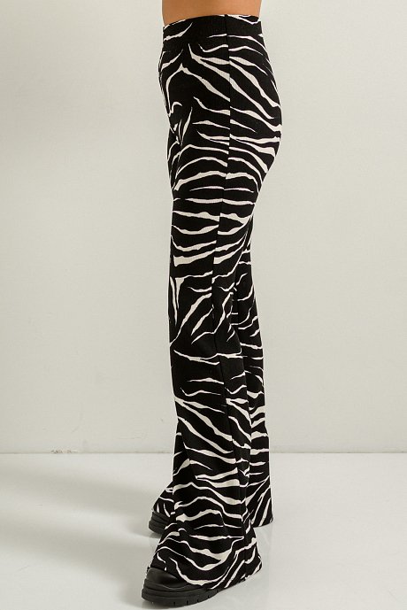 Flared trousers with zebra print