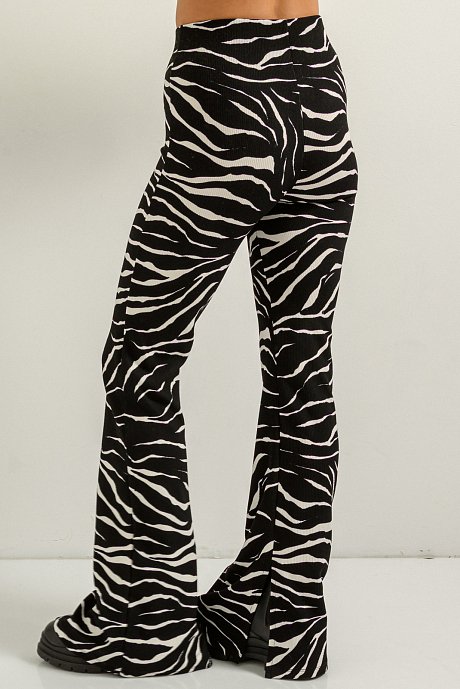 Flared trousers with zebra print