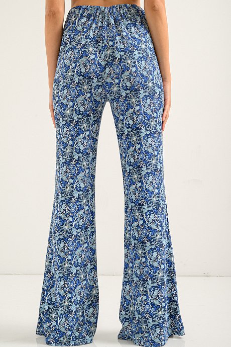 Flared trousers with floral print