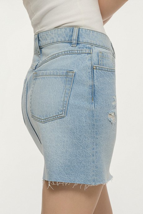 Mini denim skirt with loose threads