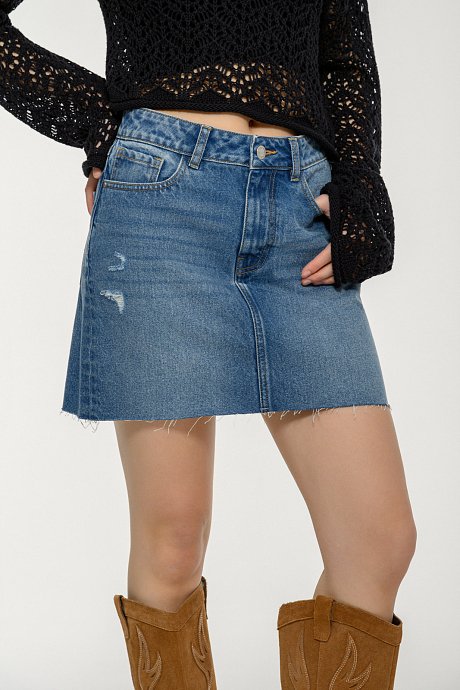 Mini denim skirt with loose threads