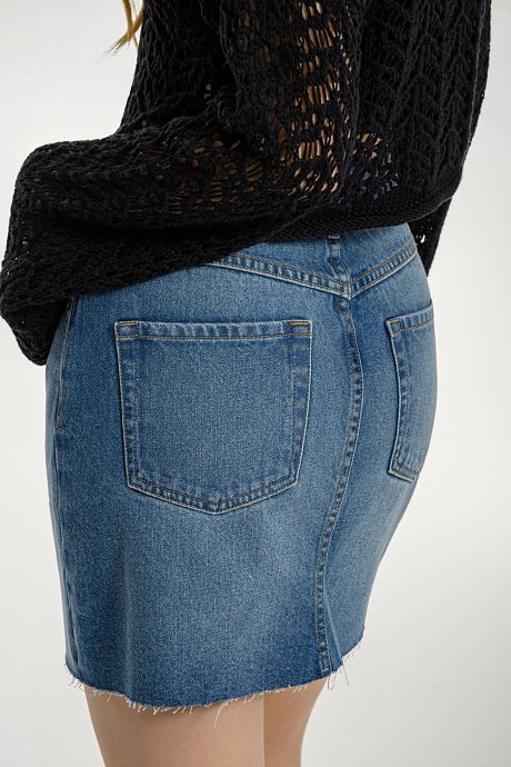 Mini denim skirt with loose threads
