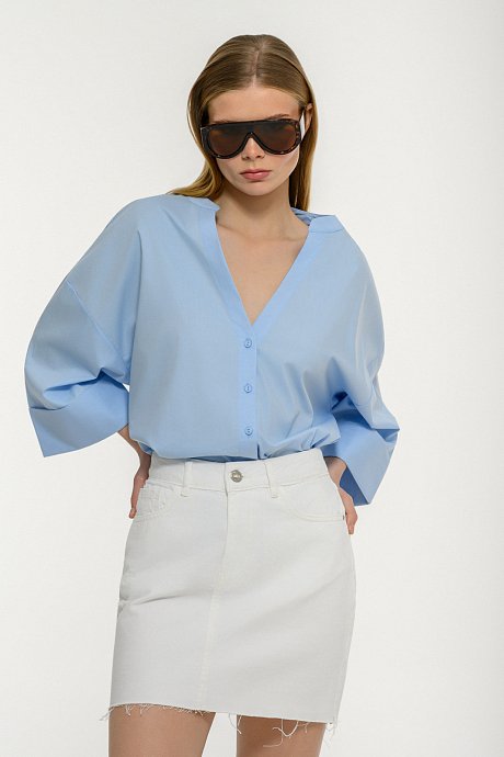 Mini white denim skirt with loose threads