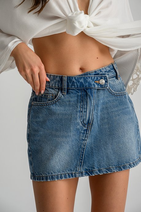 Mini crossover denim skirt