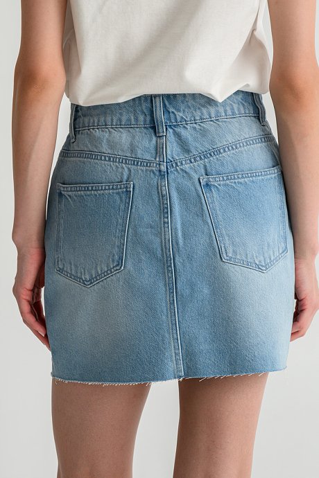 Mini denim skirt with loose threads