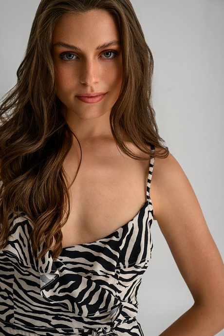 Mini dress with ruffle details and zebra print