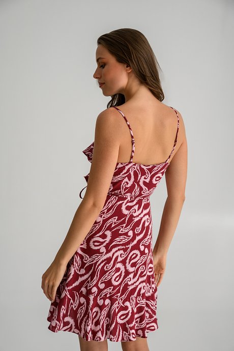 Mini dress with ruffle details and paisley print