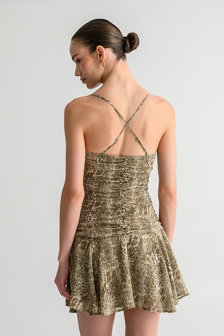 Mini dress with snake print and cross-back