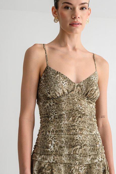 Mini dress with snake print and cross-back