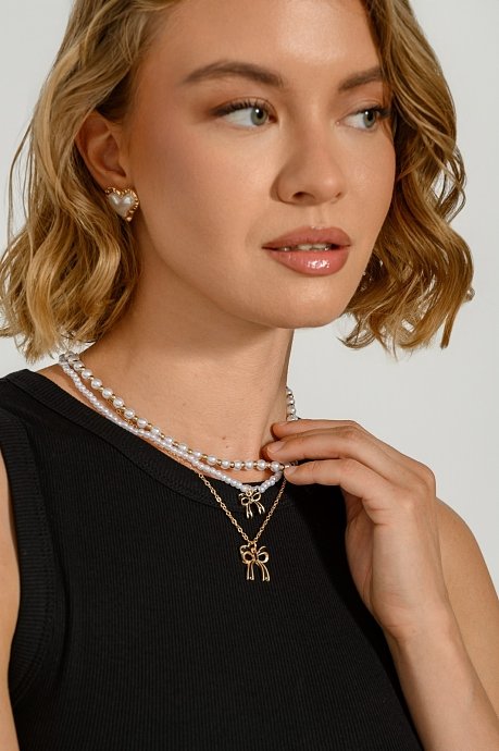 Set of necklaces with bow charms