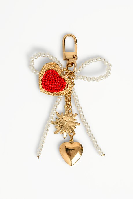 Bow shaped keychain with faux pearls