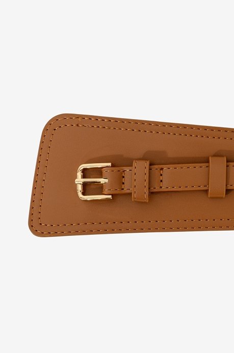 Wide asymmetric belt with leather effect