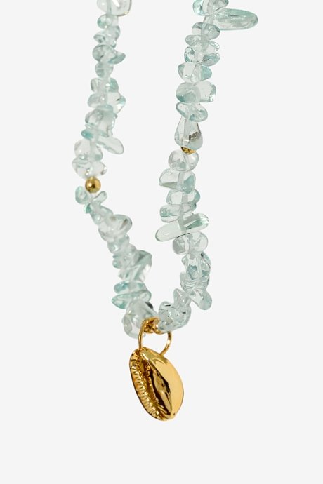 Necklace with decorative stones and seashell charm