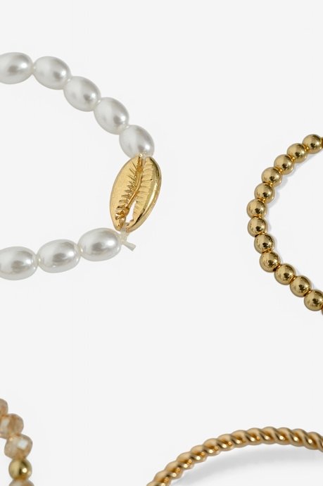 Set of gold effect bracelets