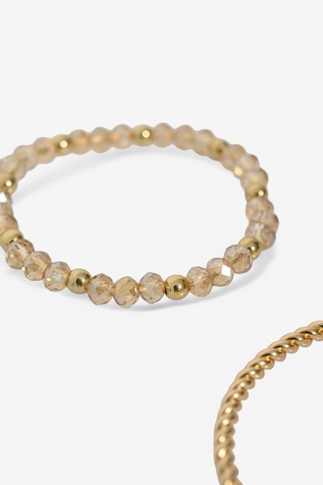 Set of gold effect bracelets