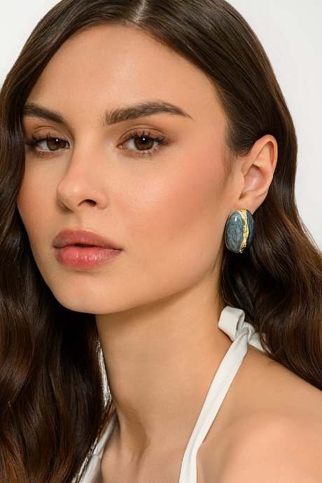 Oval earrings with gold tone detail