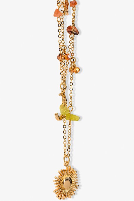 Set of gold tone chain necklaces with pendants