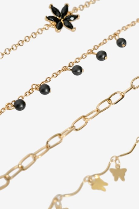 Set of chain bracelets with gold effect