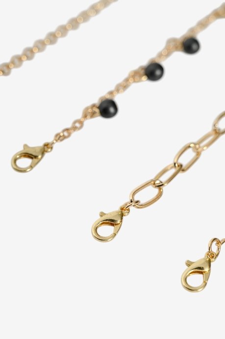 Set of chain bracelets with gold effect